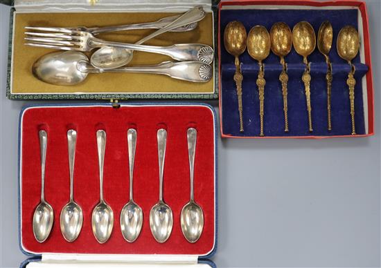 Two cased sets of coffee spoons including silver and five items of French white metal flatware.